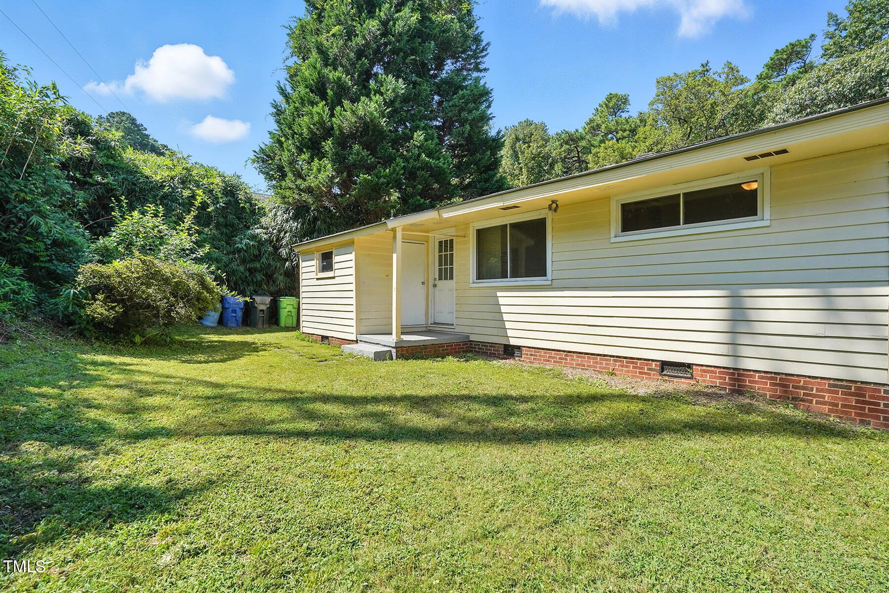 912 Dixie Trail Raleigh, NC 27607 - Photo 25 of 27 a front view of a house with a yard