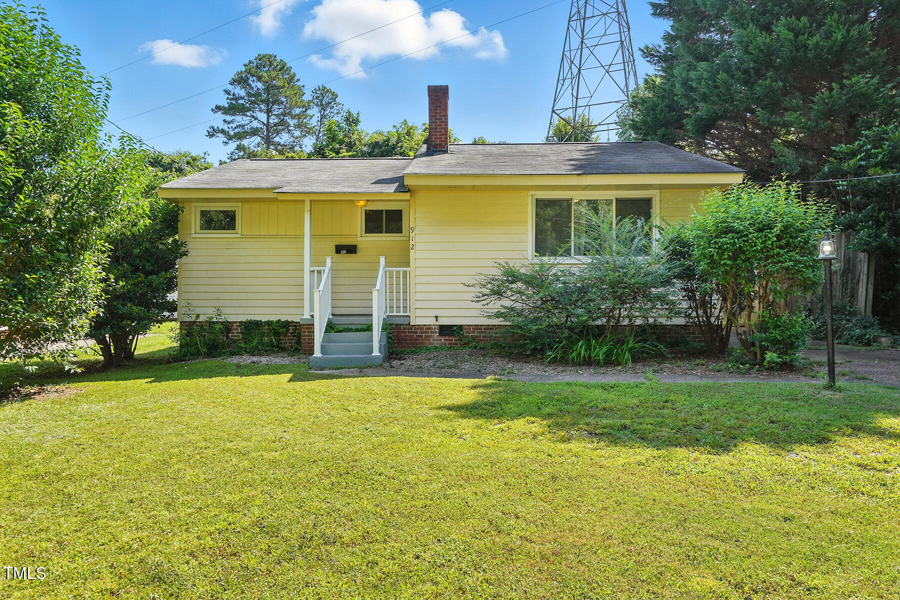 912 Dixie Trail Raleigh, NC 27607 - Photo 2 of 28 a view of a house with a backyard