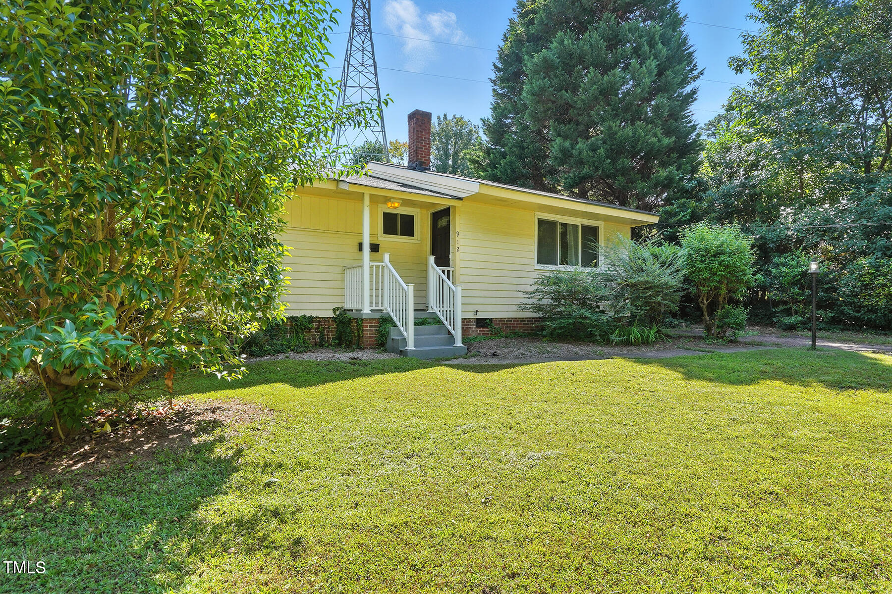 912 Dixie Trail Raleigh, NC 27607 - Photo 4 of 28 a view of a house with swimming pool