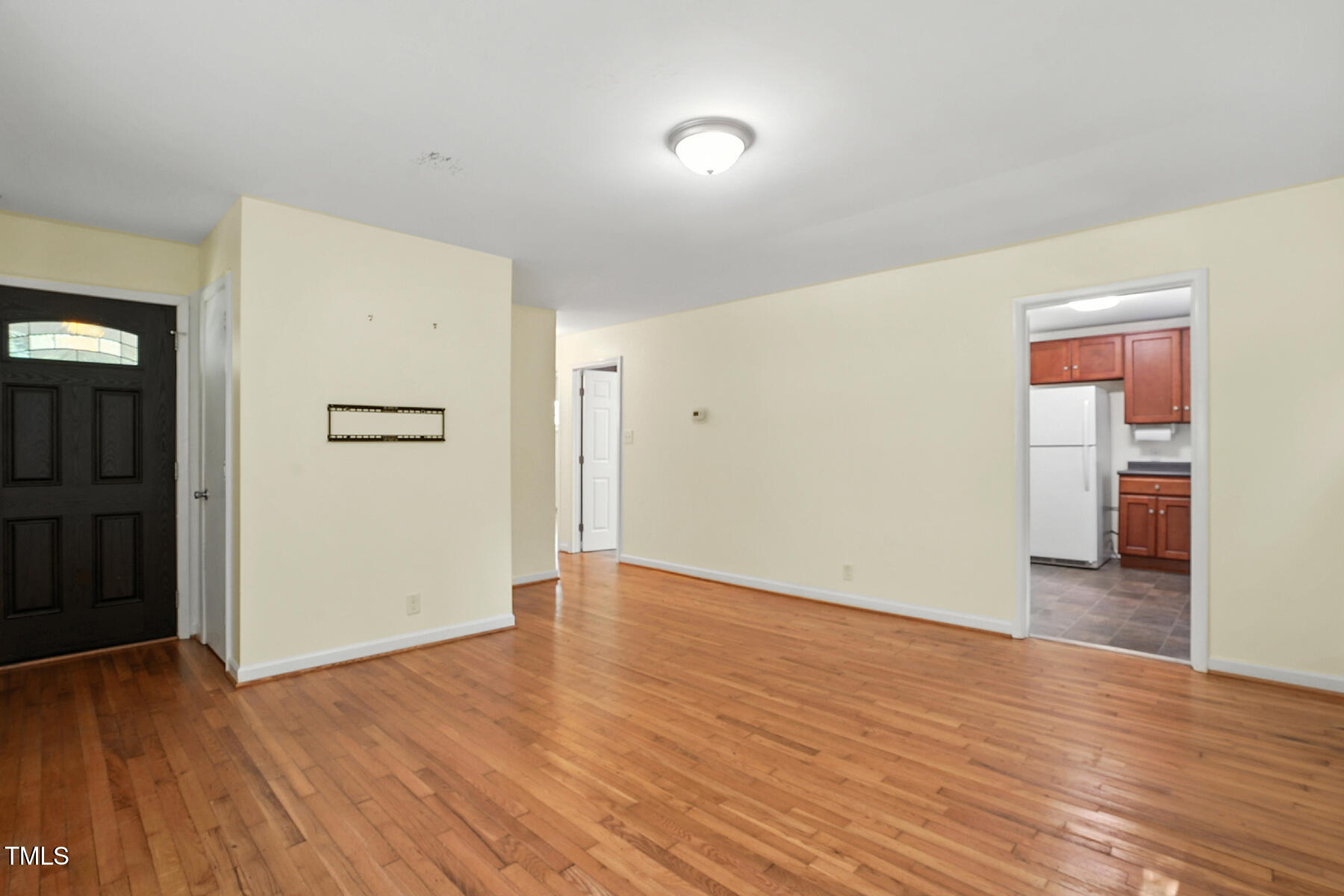 912 Dixie Trail Raleigh, NC 27607 - Photo 7 of 27 wooden floor in an empty room