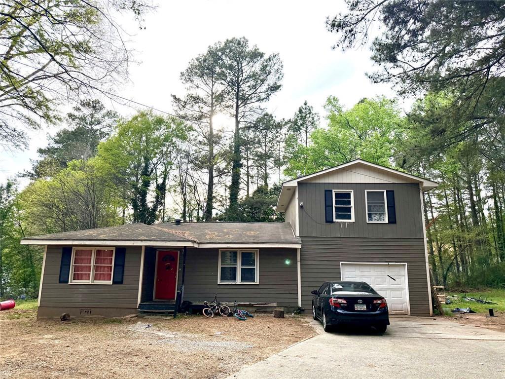 a car parked in front of a house