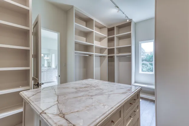 a room with a sink and a window