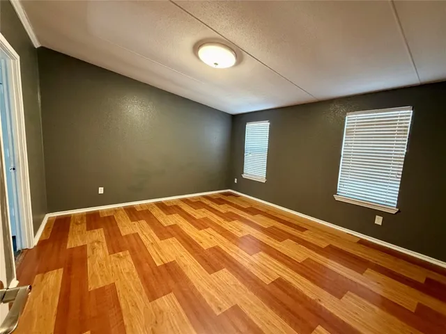 a view of a room with a bedroom