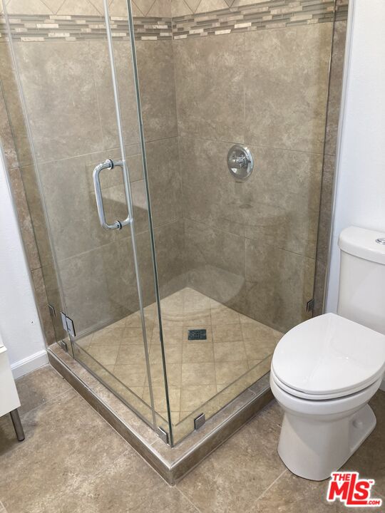 903 Arnold Drive Placentia, CA 92870 - Photo 7 of 11 a bathroom with a toilet and a shower