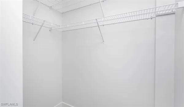 a view of a room with racks on the wall