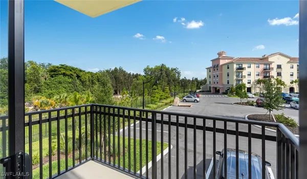 a view of a balcony with an outdoor space