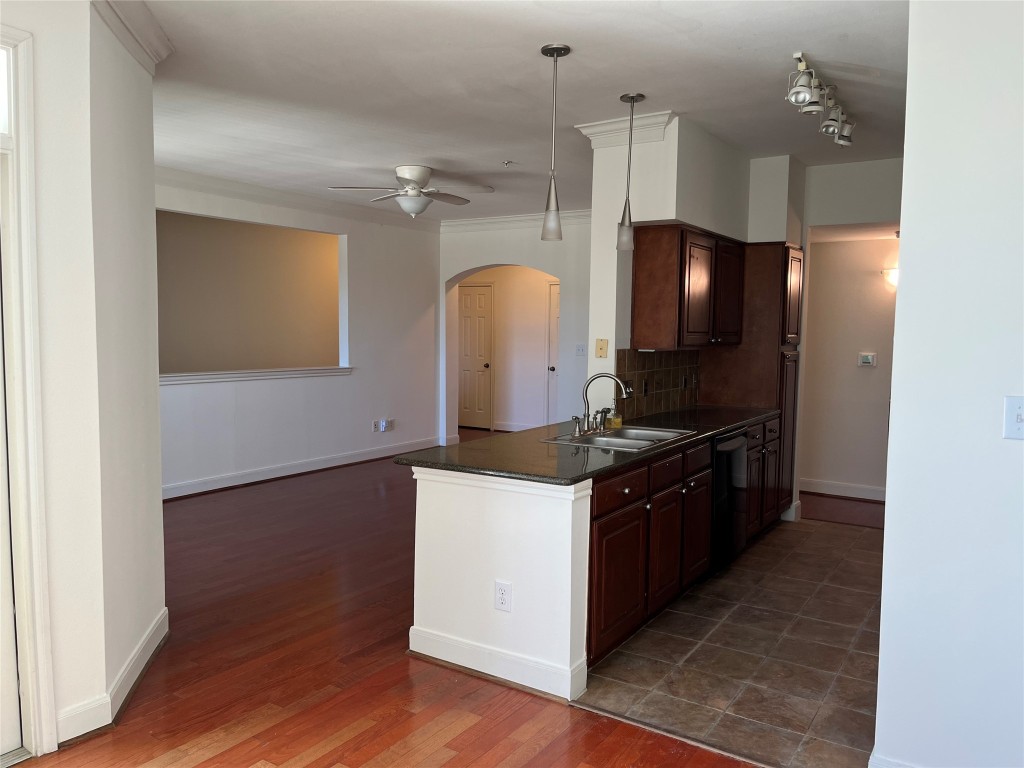 7701 Rialto Boulevard, Unit 1326 Austin, TX 78735 - Photo 1 of 27 a kitchen with granite countertop a stove and a refrigerator