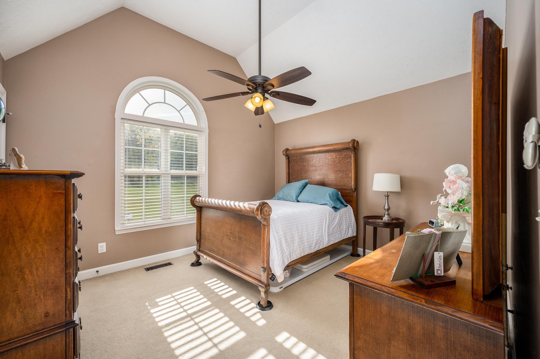 13459 Versailles Road Rockvale, TN 37153 - Photo 16 of 40 a bedroom with bed and window