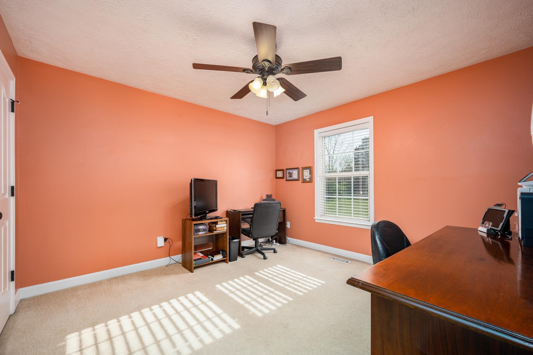 13459 Versailles Road Rockvale, TN 37153 - Photo 18 of 40 a view of a workspace with furniture and a window