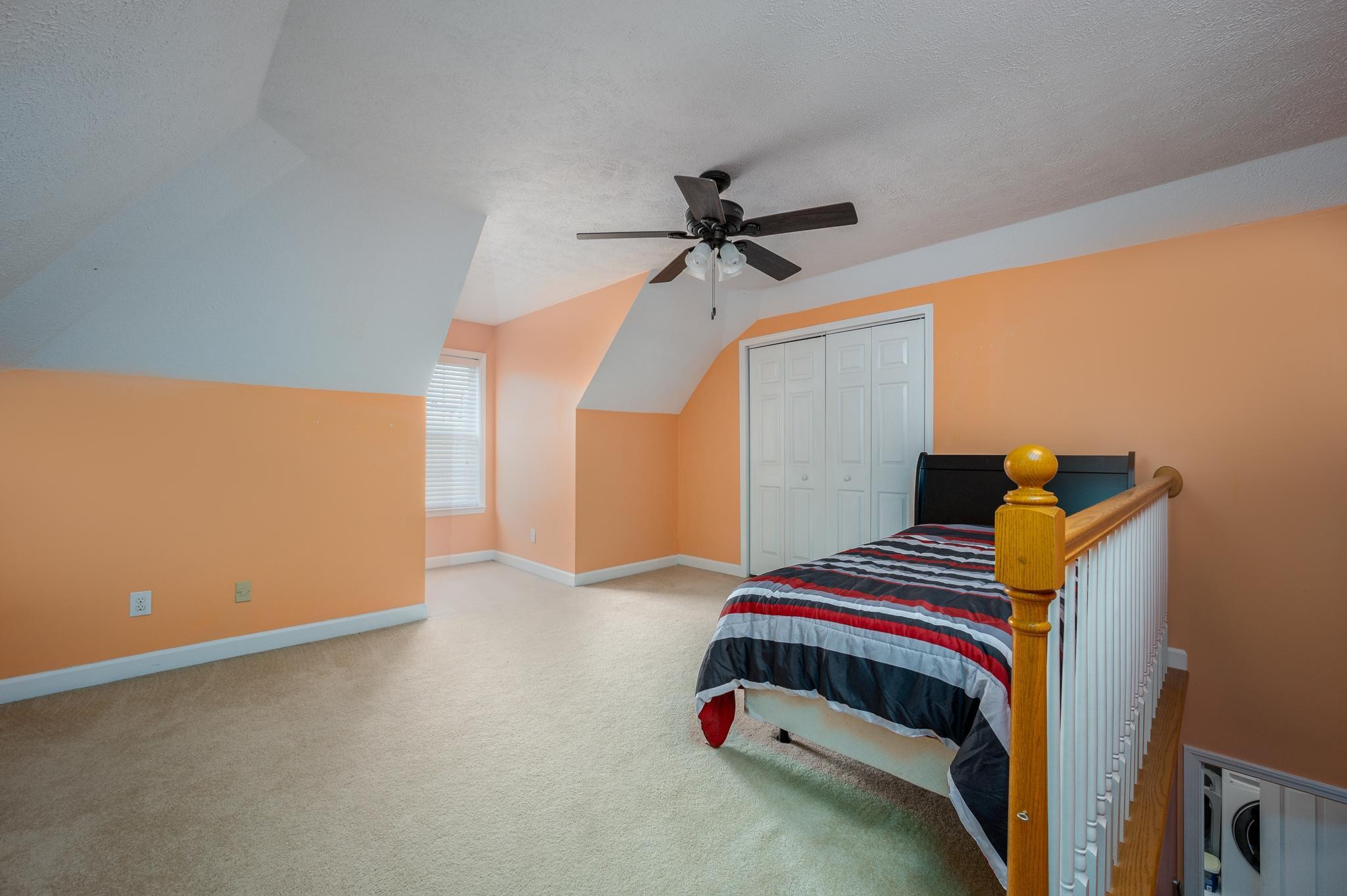 13459 Versailles Road Rockvale, TN 37153 - Photo 20 of 40 a bedroom with a bed and a chandelier