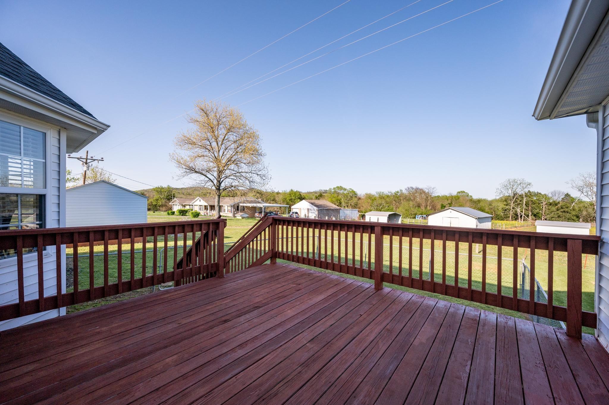 13459 Versailles Road Rockvale, TN 37153 - Photo 21 of 40 a view of balcony with wooden floor