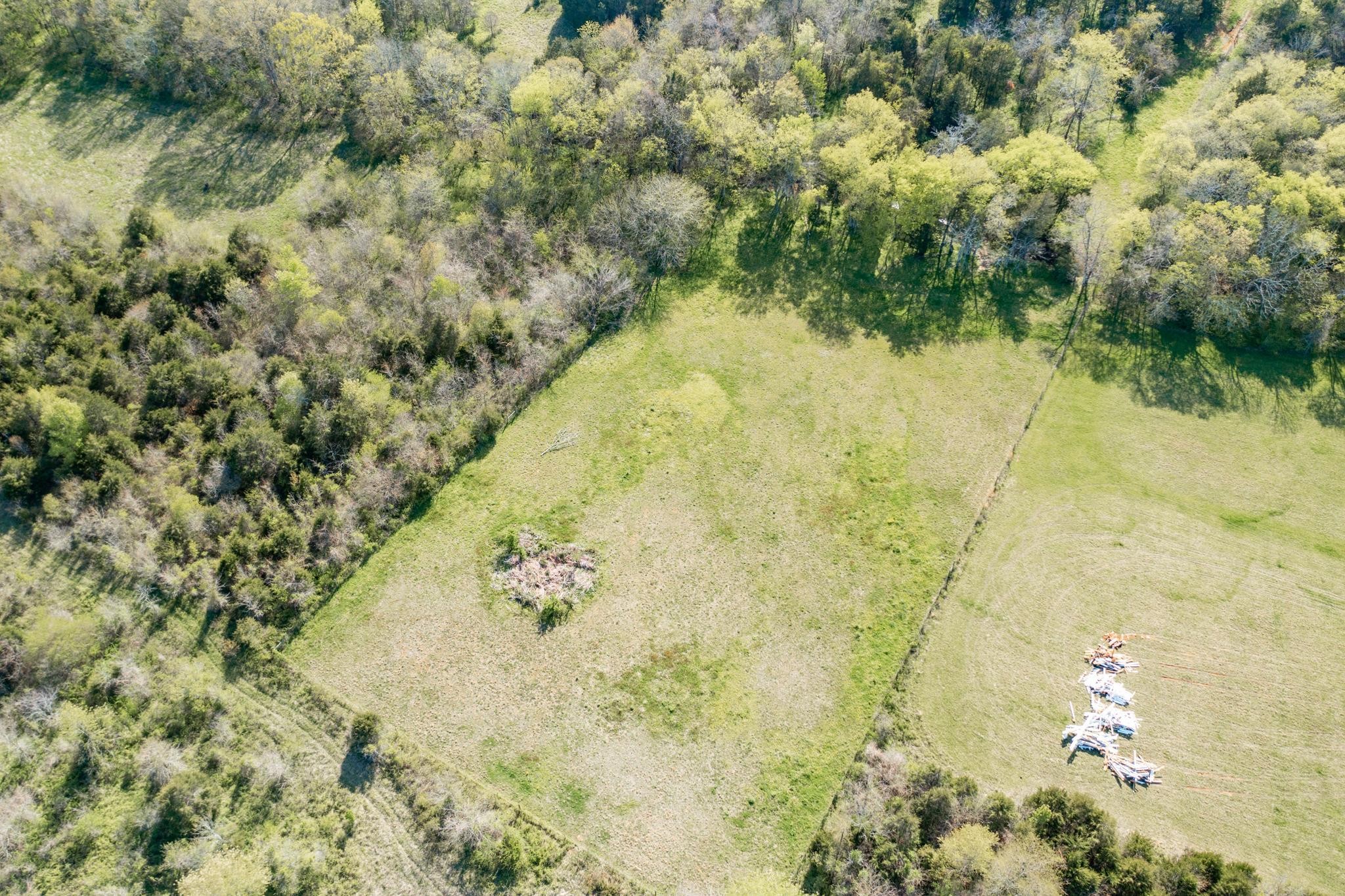 13459 Versailles Road Rockvale, TN 37153 - Photo 27 of 40 a view of a lake with a yard