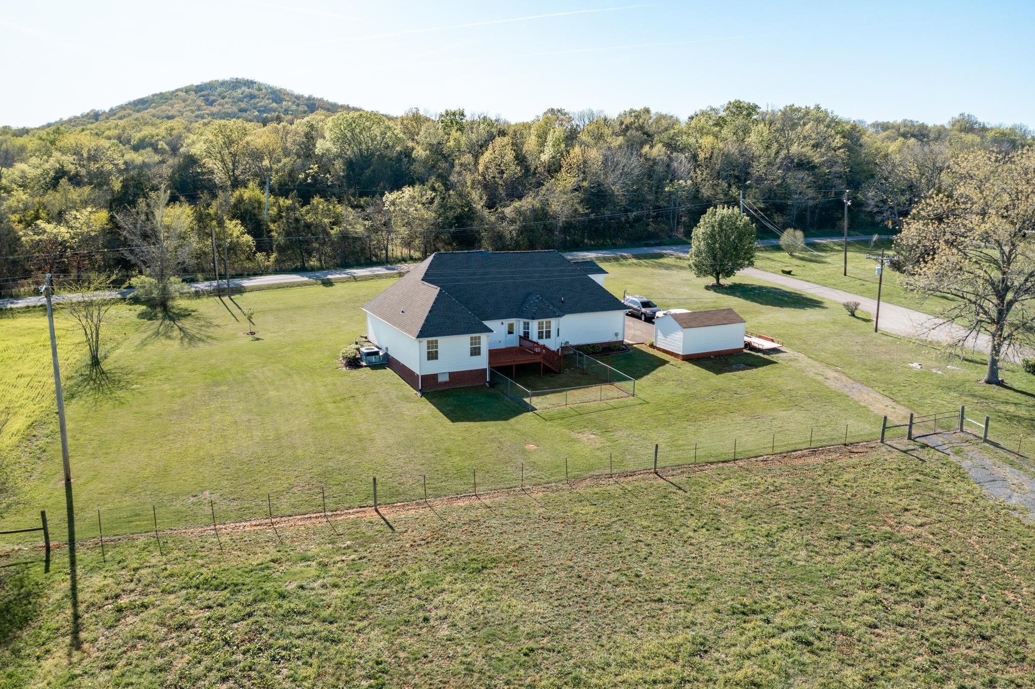 13459 Versailles Road Rockvale, TN 37153 - Photo 36 of 40 a view of a lake with a mountain