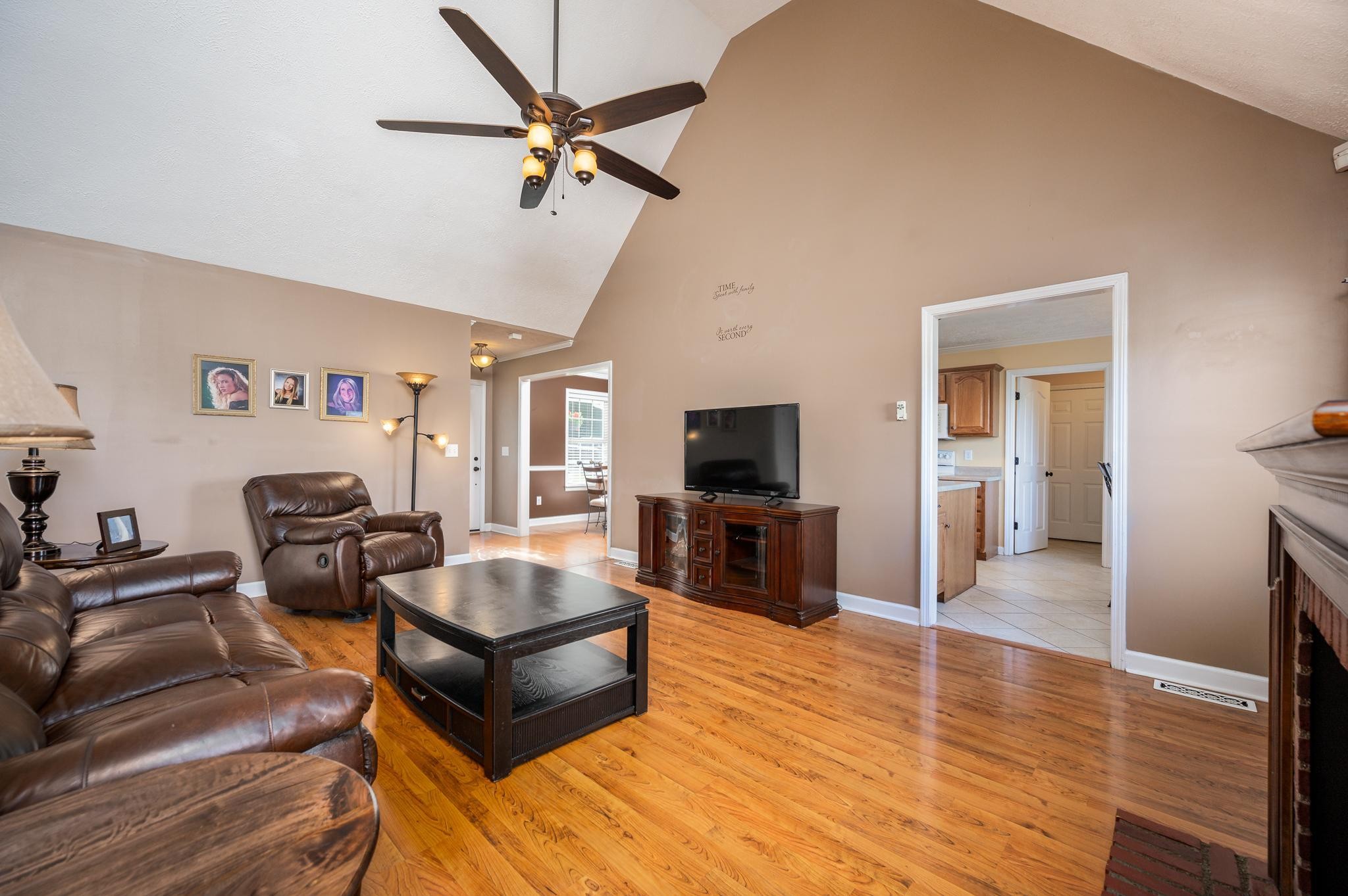 13459 Versailles Road Rockvale, TN 37153 - Photo 7 of 40 a living room with furniture and a flat screen tv