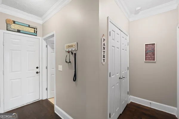 a bathroom with a shower and a sink