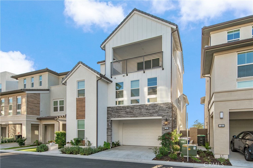 131 Reyes Alley Lake Forest, CA 92630 - Photo 3 of 39 a front view of a multi story building