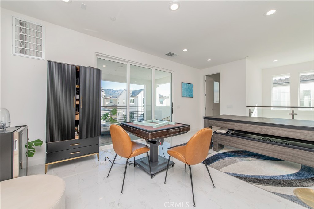 131 Reyes Alley Lake Forest, CA 92630 - Photo 31 of 39 a dining room with furniture and window