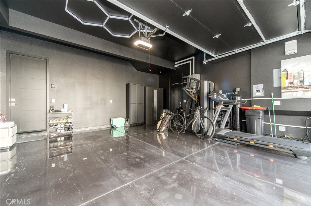 131 Reyes Alley Lake Forest, CA 92630 - Photo 4 of 39 a view of a room with gym equipment