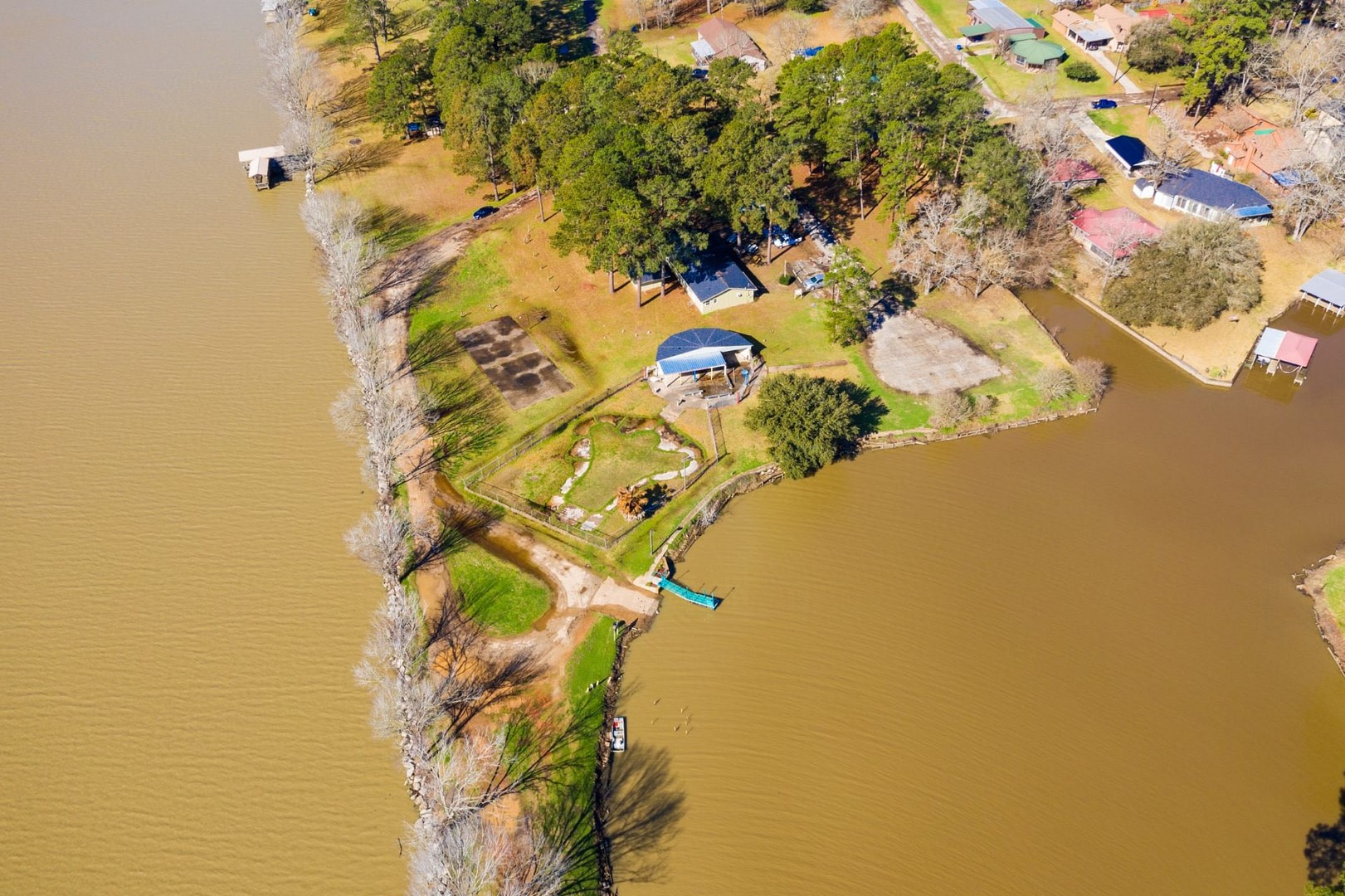 10-11 Rabbit Run Lane Trinity, TX 75862 - Photo 16 of 30 a vase with flowers on it