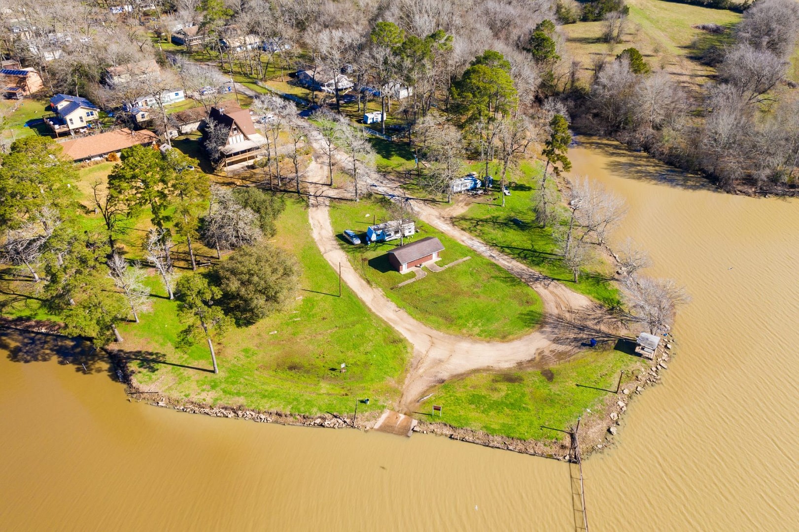 10-11 Rabbit Run Lane Trinity, TX 75862 - Photo 19 of 30 an aerial view of a house with a swimming pool