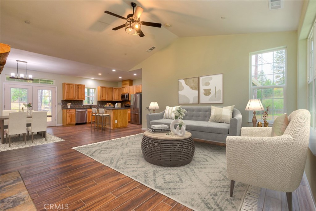 13159 Mullen Way Oroville, CA 95965 - Photo 3 of 50 a living room with furniture and a wooden floor