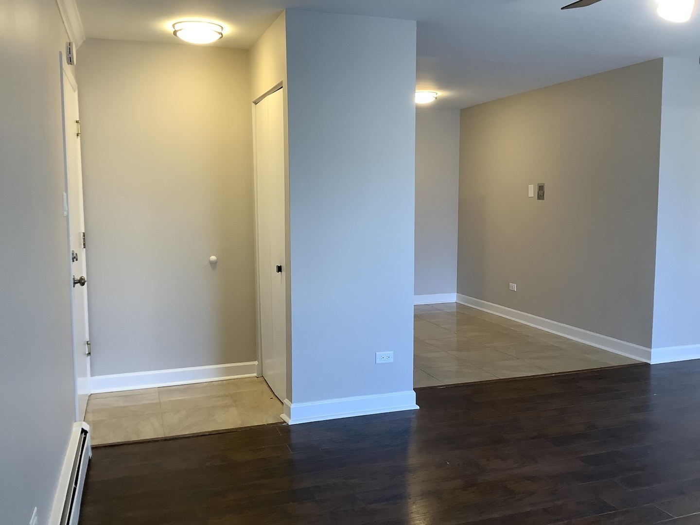 10530 Parkside Avenue, Unit 10 Chicago Ridge, IL 60415 - Photo 19 of 30 an empty room with wooden floor
