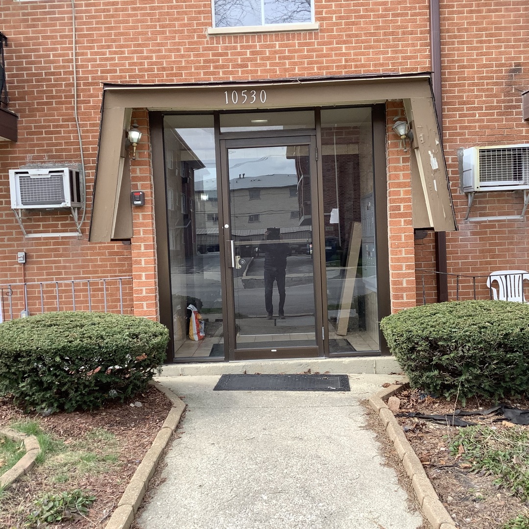 10530 Parkside Avenue, Unit 10 Chicago Ridge, IL 60415 - Photo 3 of 30 a view of entrance front of the house