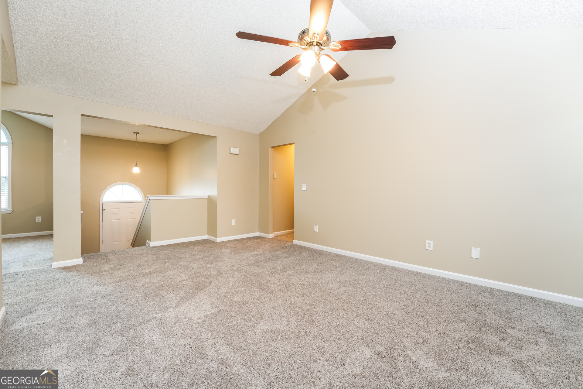 573 Ransom Way Stockbridge, GA 30281 - Photo 3 of 17 a view of a room with a ceiling fan and a chandelier fan
