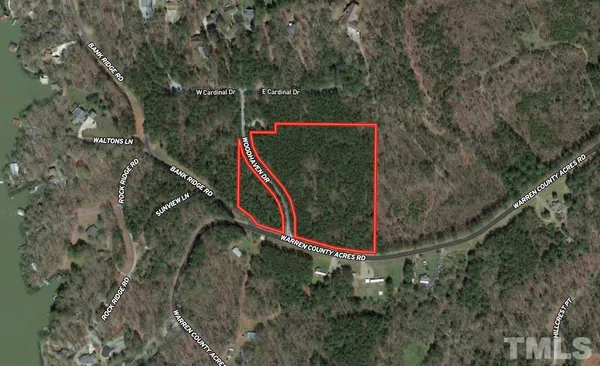 a view of a fence in a forest