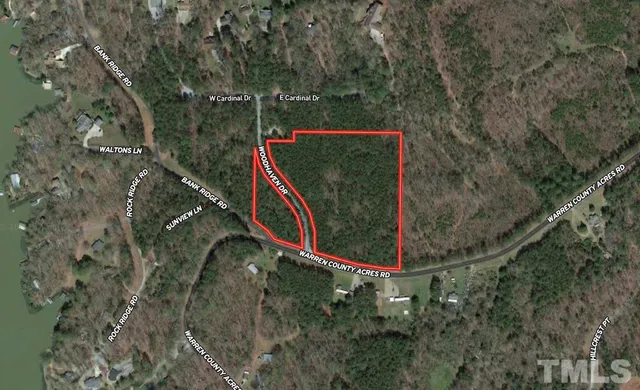 a view of a fence in a forest