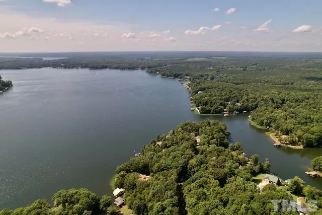 a view of a lake with a city