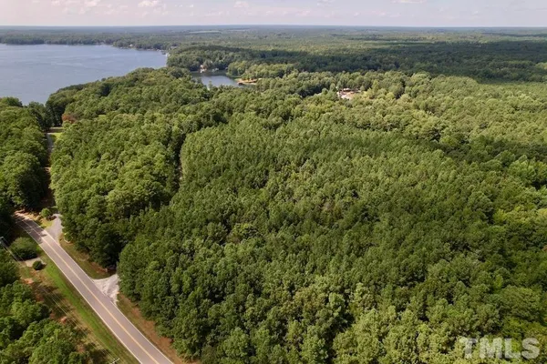 a view of a yard with an outdoor seating