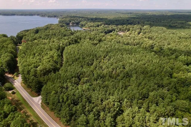 a view of a yard with an outdoor seating