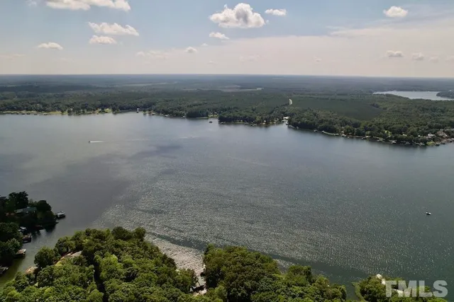 a view of a lake with a yard