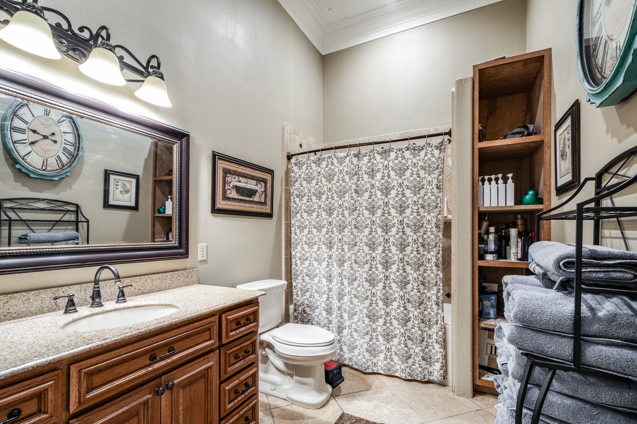 11105 Crockett Martin Road Conroe, TX 77306 - Photo 21 of 35 a bathroom with a sink a toilet and a shower