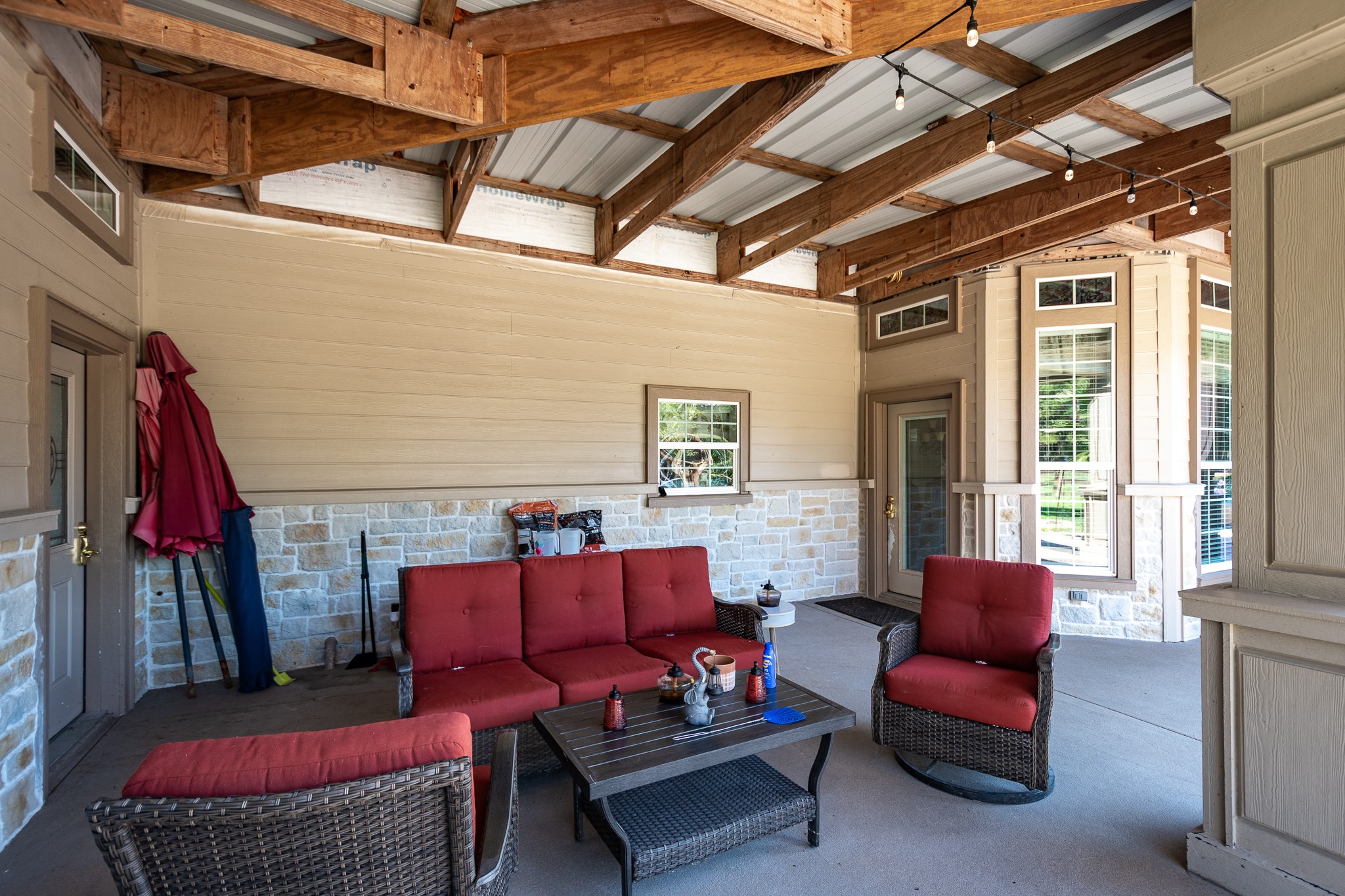 11105 Crockett Martin Road Conroe, TX 77306 - Photo 26 of 35 a outdoor living space with furniture and a rug