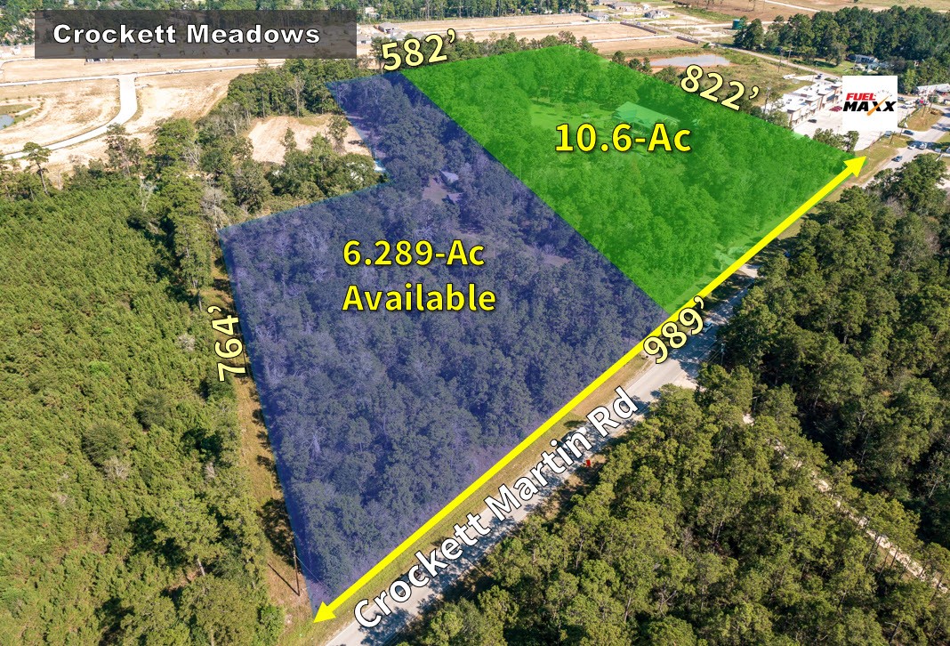 11105 Crockett Martin Road Conroe, TX 77306 - Photo 3 of 35 a sign on the side of the road