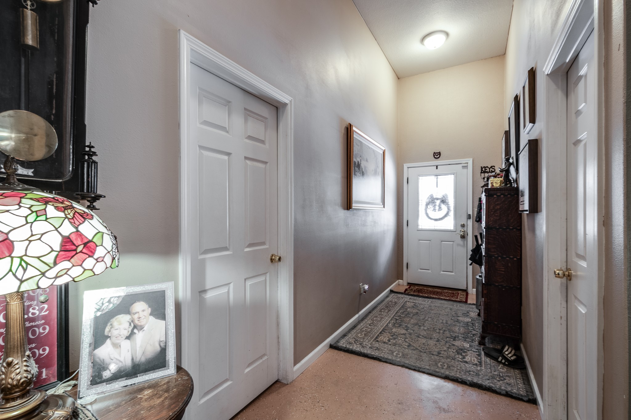 11105 Crockett Martin Road Conroe, TX 77306 - Photo 7 of 35 workspace with wooden floor bathroom and mirror