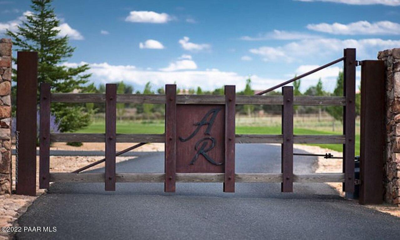 9630 North Equine Road Prescott, AZ 86305 - Photo 20 of 28 a view of a porch with a bench