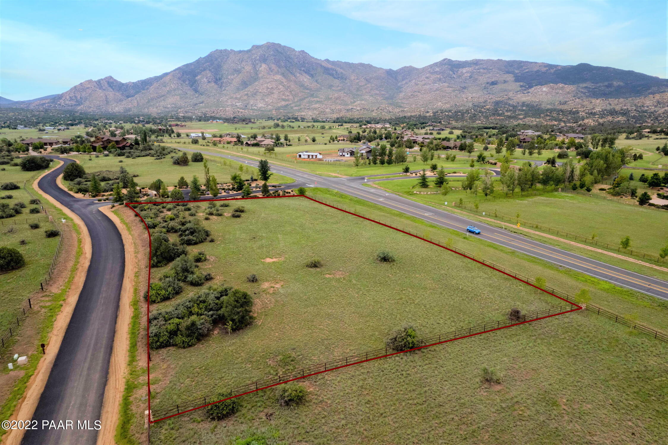 9630 North Equine Road Prescott, AZ 86305 - Photo 2 of 28 a view of a lush green hillside and houses