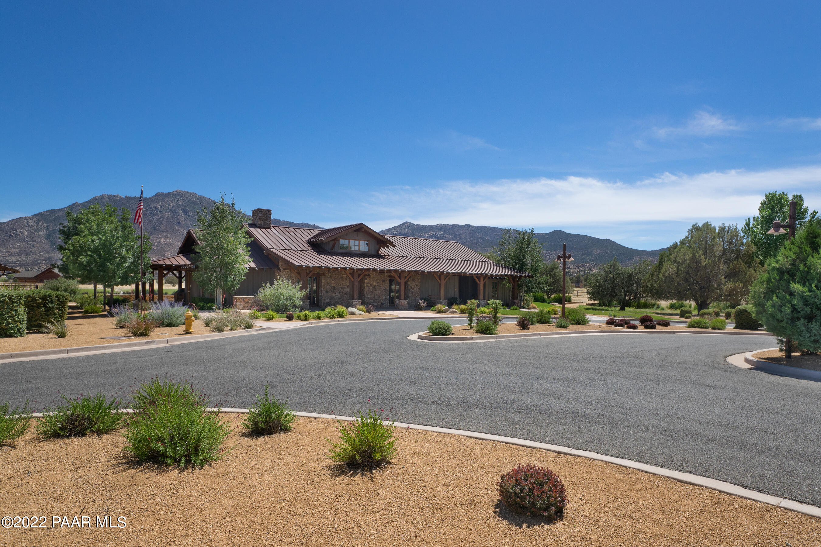 9630 North Equine Road Prescott, AZ 86305 - Photo 24 of 28 a view of a house with a yard and sitting area