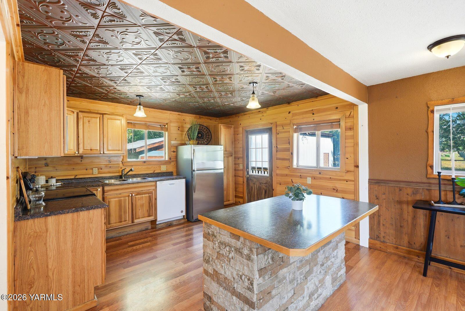 3780 Nile Road Naches, WA 98937 - Photo 9 of 43 a kitchen with stainless steel appliances granite countertop a stove and refrigerator