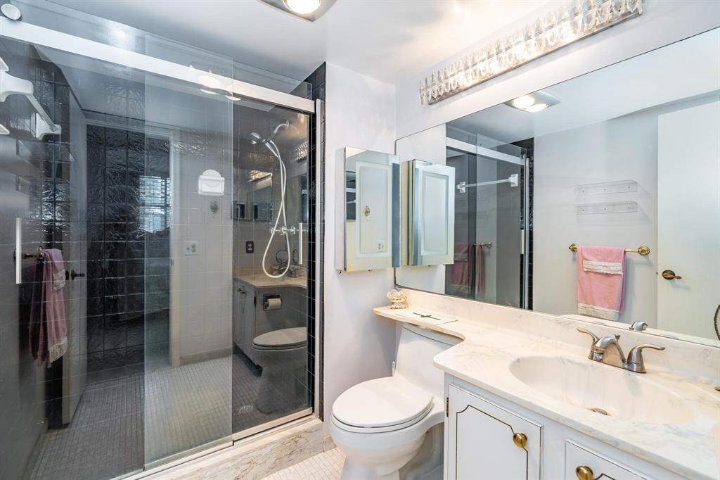 9500 North Hollybrook Lake Drive, Unit 109 Pembroke Pines, FL 33025 - Photo 3 of 57 a bathroom with a granite countertop sink toilet and shower