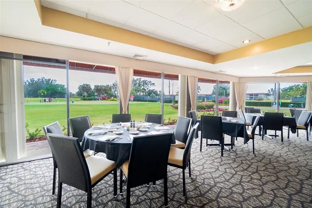 a dining room with furniture outdoor view and a garden