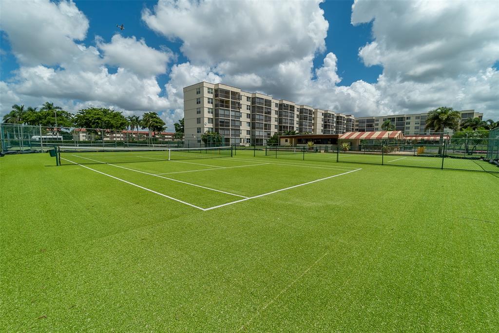 9500 North Hollybrook Lake Drive, Unit 109 Pembroke Pines, FL 33025 - Photo 36 of 57 a view of a tennis court