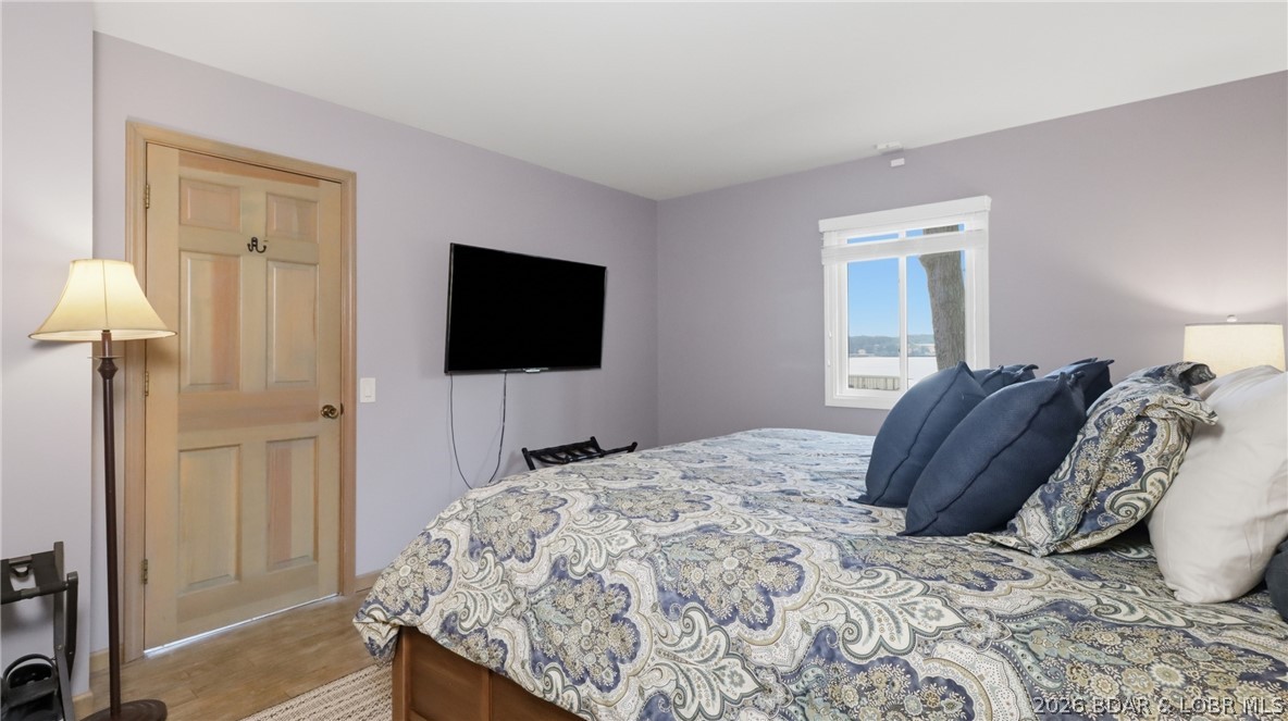 1069 Indian Hill Road Sunrise Beach, MO 65079 - Photo 11 of 54 Primary Bedroom