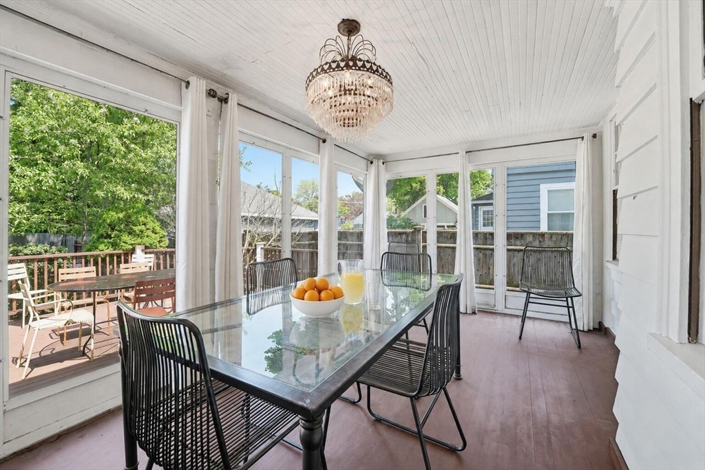 19 Humphrey Street Marblehead, MA 01945 - Photo 13 of 29 a view of a dining room with furniture window and wooden floor
