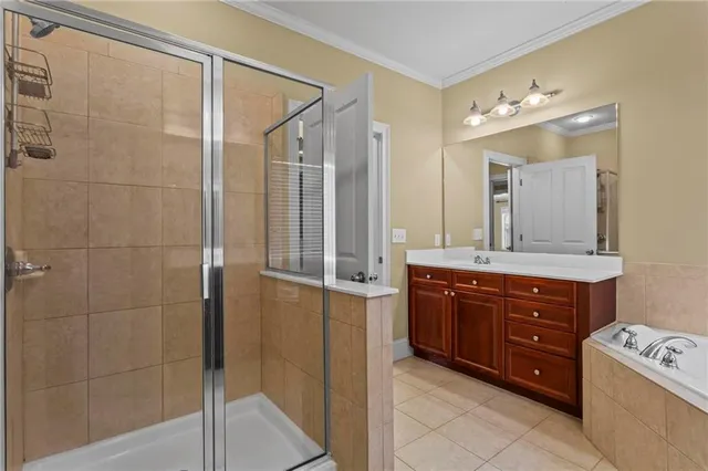 a bathroom with a double vanity sink mirror and shower