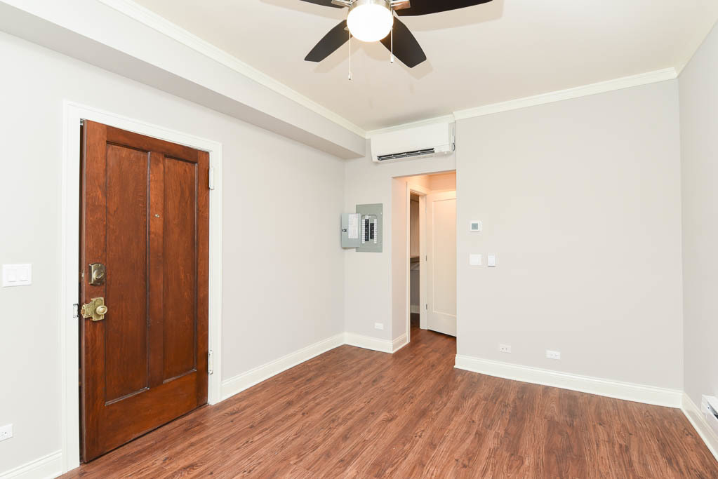 640 West Wrightwood Avenue, Unit 106 Chicago, IL 60614 - Photo 6 of 15 wooden floor in an empty room