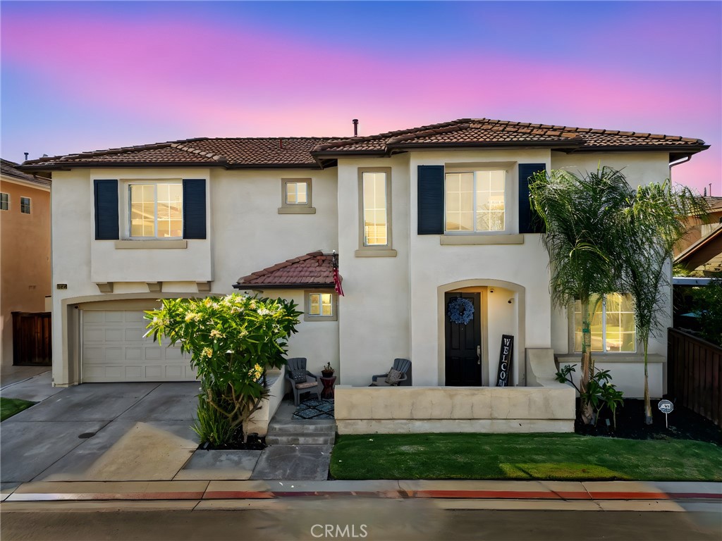 11317 Riverleaf Drive Riverside, CA 92505 - Photo 1 of 1 a front view of a house with a garden